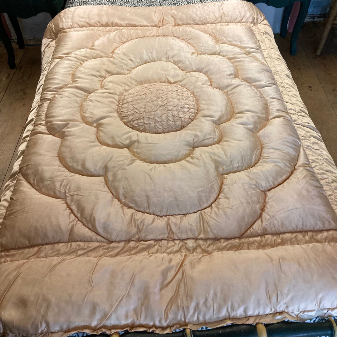Vintage 1930s Single Eiderdown featuring a beautiful creamy apricot gold satin flower design.