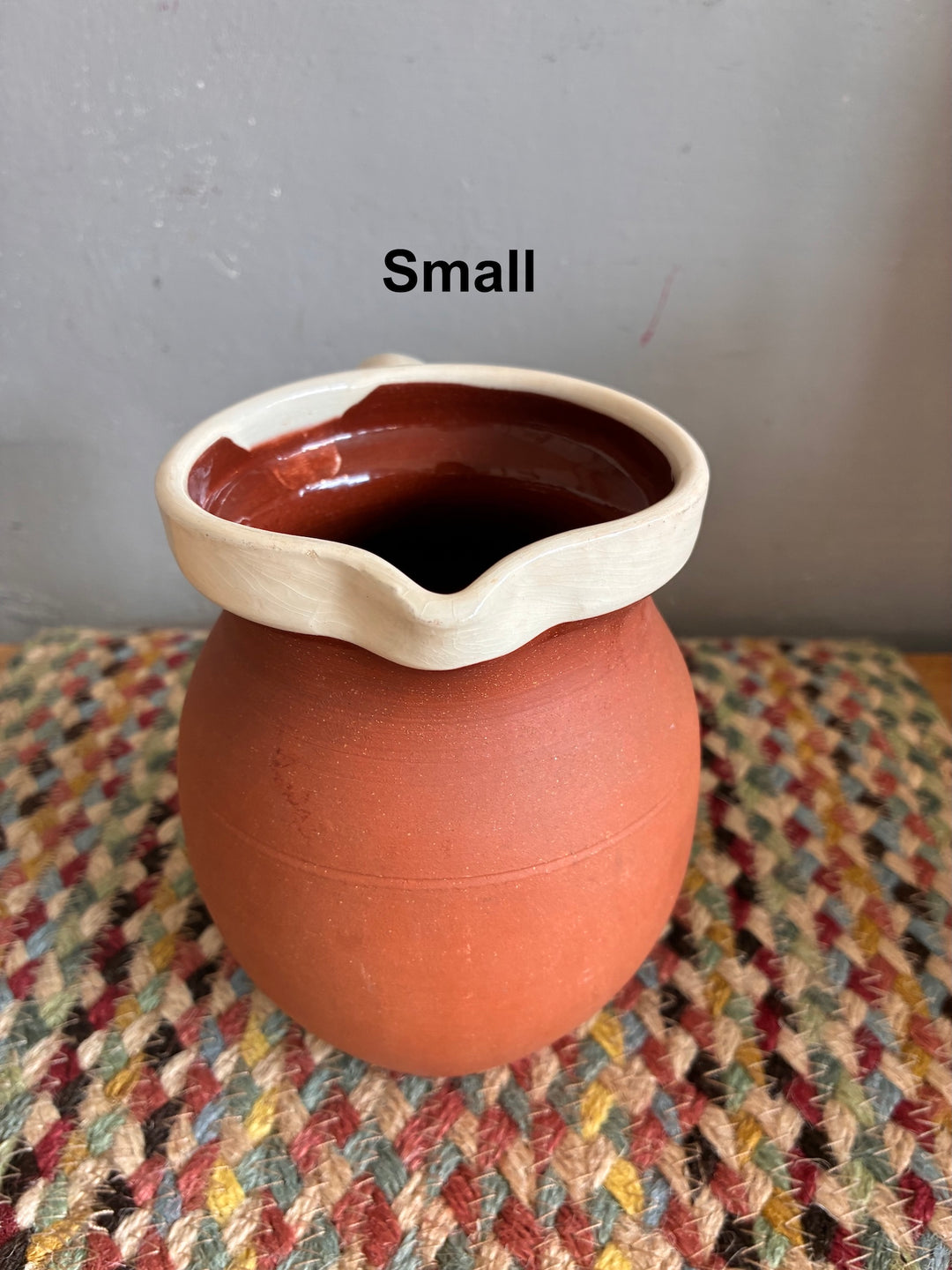 Vintage Slipware Terracotta Jug - North Devon, small terracotta jug with cream slipware rim.