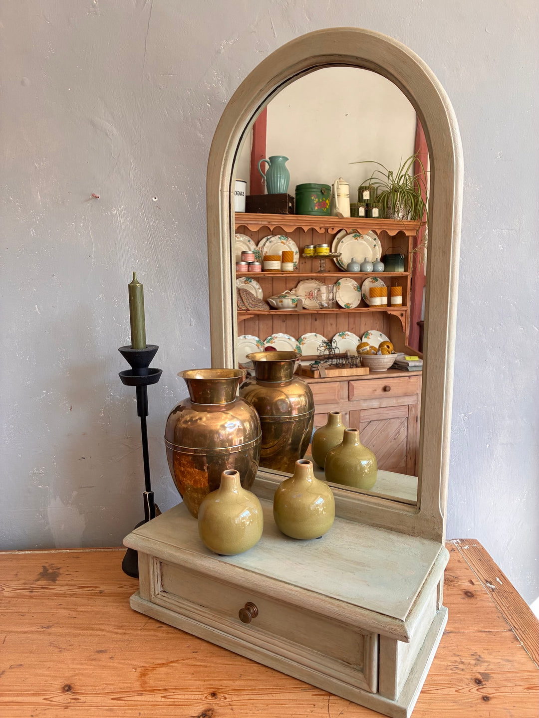 Wall Hanging Vintage Mirror with Drawer showcasing decorative vases and rustic home decor in a charming setting.
