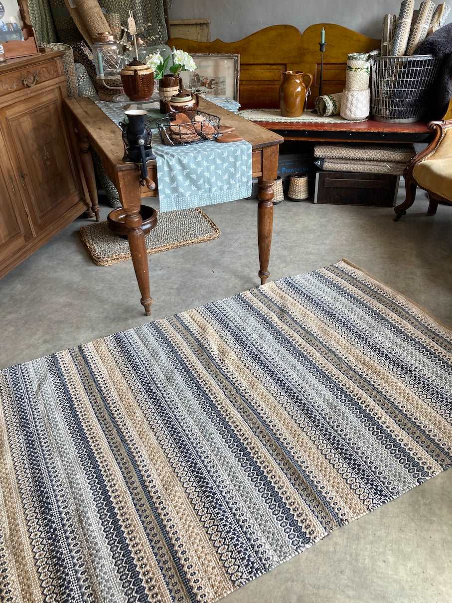 Pretty ochre and blue cotton rug for sale at Source for the Goose, South Molton, Devon