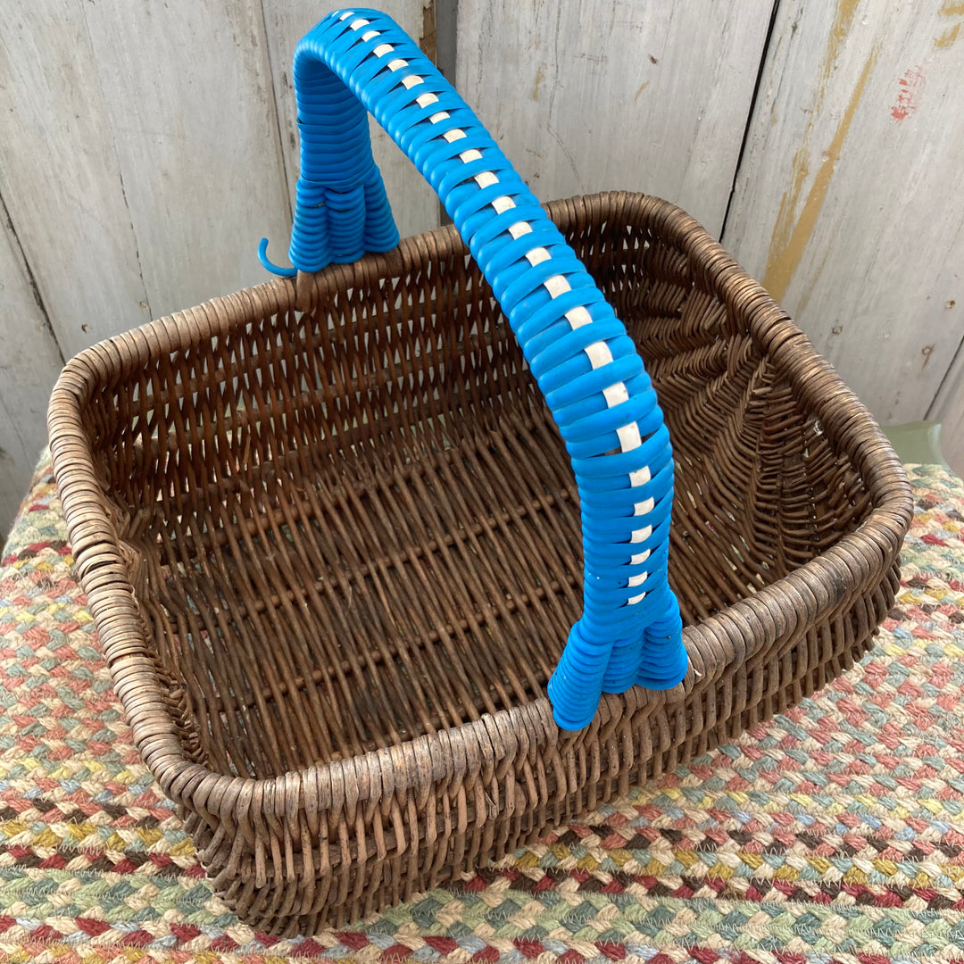 rectangular shopping basket with woven  blue and white  plastic handle