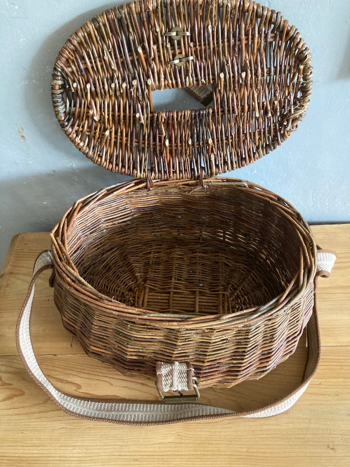 Wicker Fishing Creel with carrying strap, ideal for outdoor use or storage in a rustic home, Source for the Goose Devon.