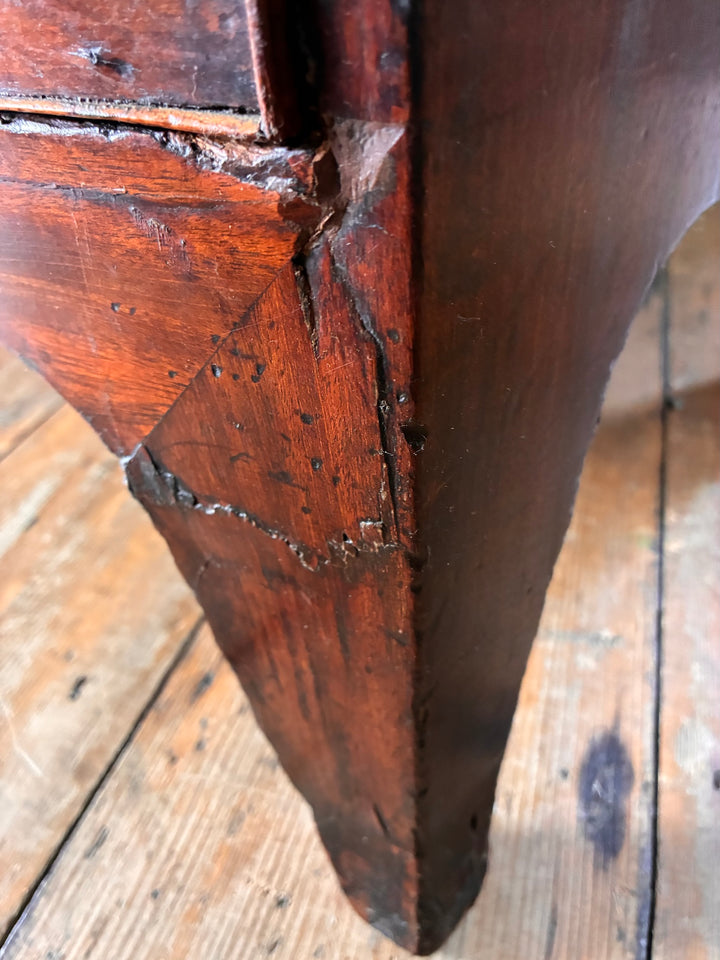 Close-up view of the Antique Mahogany Bow Front Chest of Drawers showing craftsmanship details and wood grain.