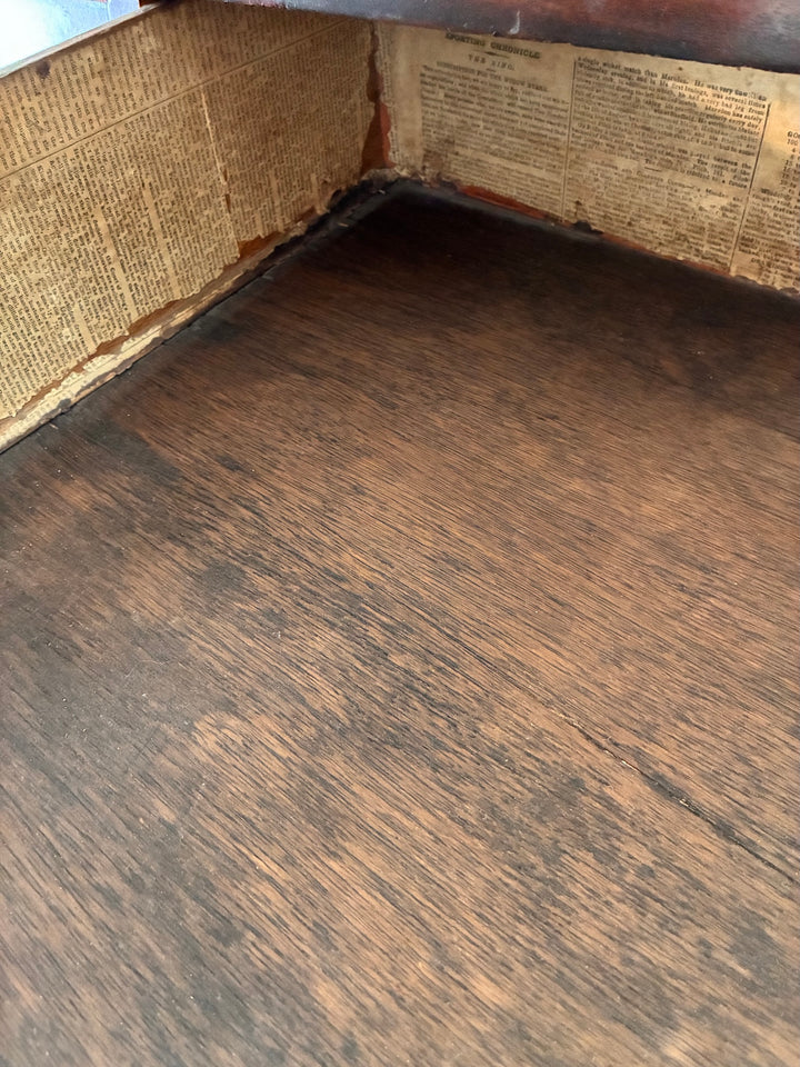 Antique Mahogany Bow Front Chest of Drawers interior lined with 1833 newspaper, showcasing vintage home style in Devon.