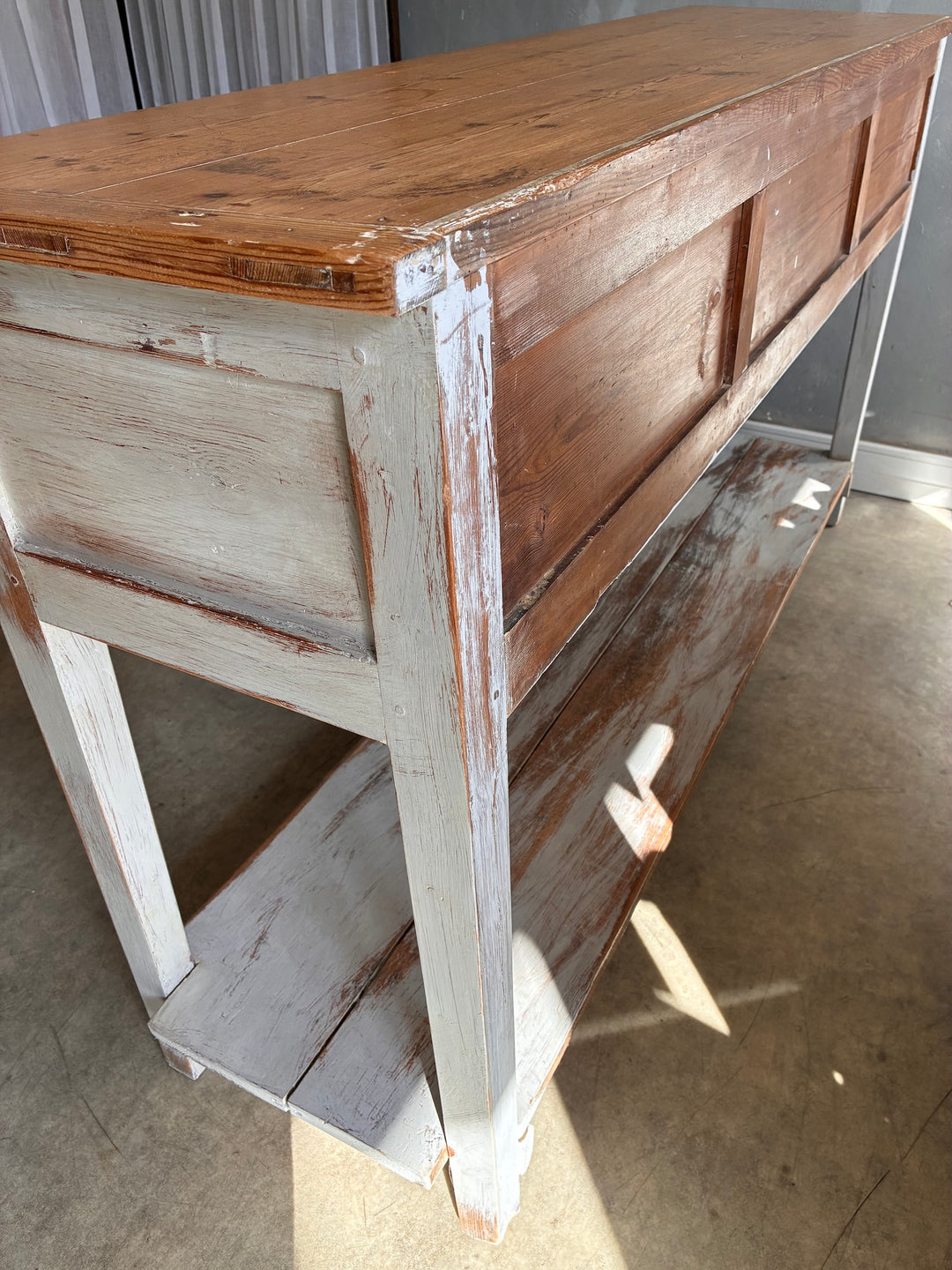 Antique Pine Potboard Dresser showcasing rustic charm with its plain pine top and distressed white base.