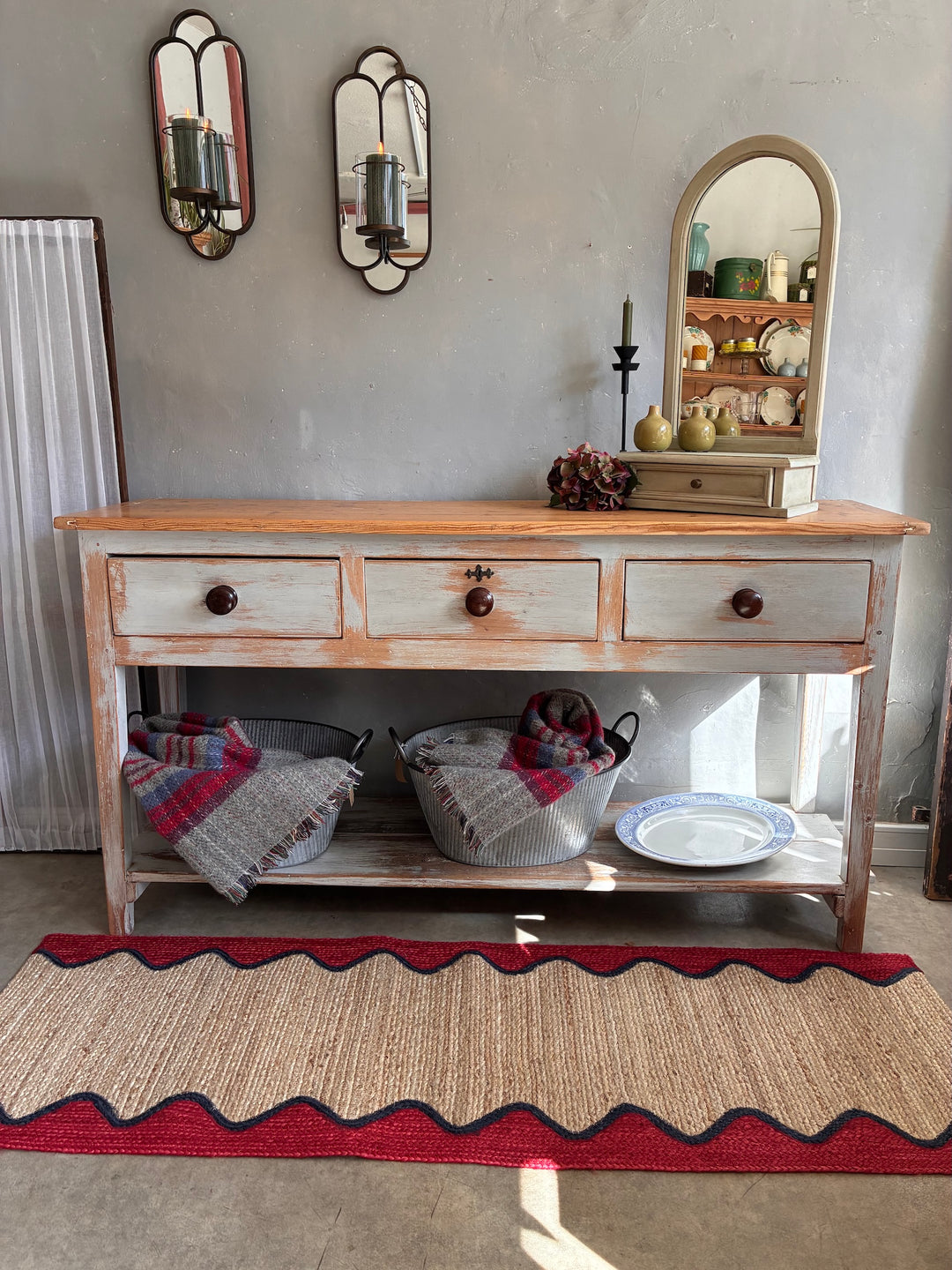 Antique Pine Potboard Dresser with three drawers, rustic top, and decorative accents in a cozy home setting.