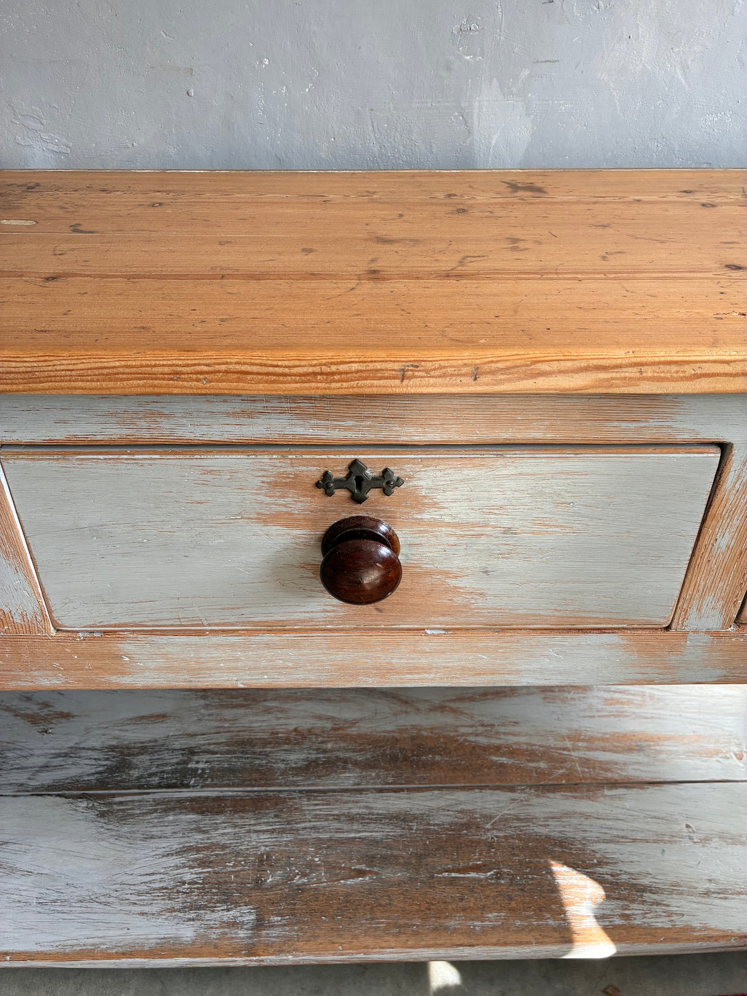 Antique Pine Potboard Dresser with rustic pine top and wooden drawer handle, showcasing mid-19th century design.