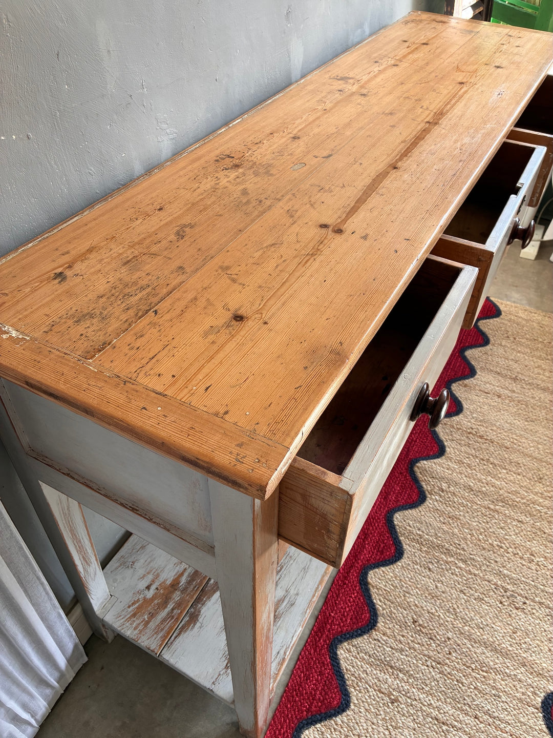 Antique Pine Potboard Dresser with distressed painted base, deep drawers, and rustic mid-19th century charm.