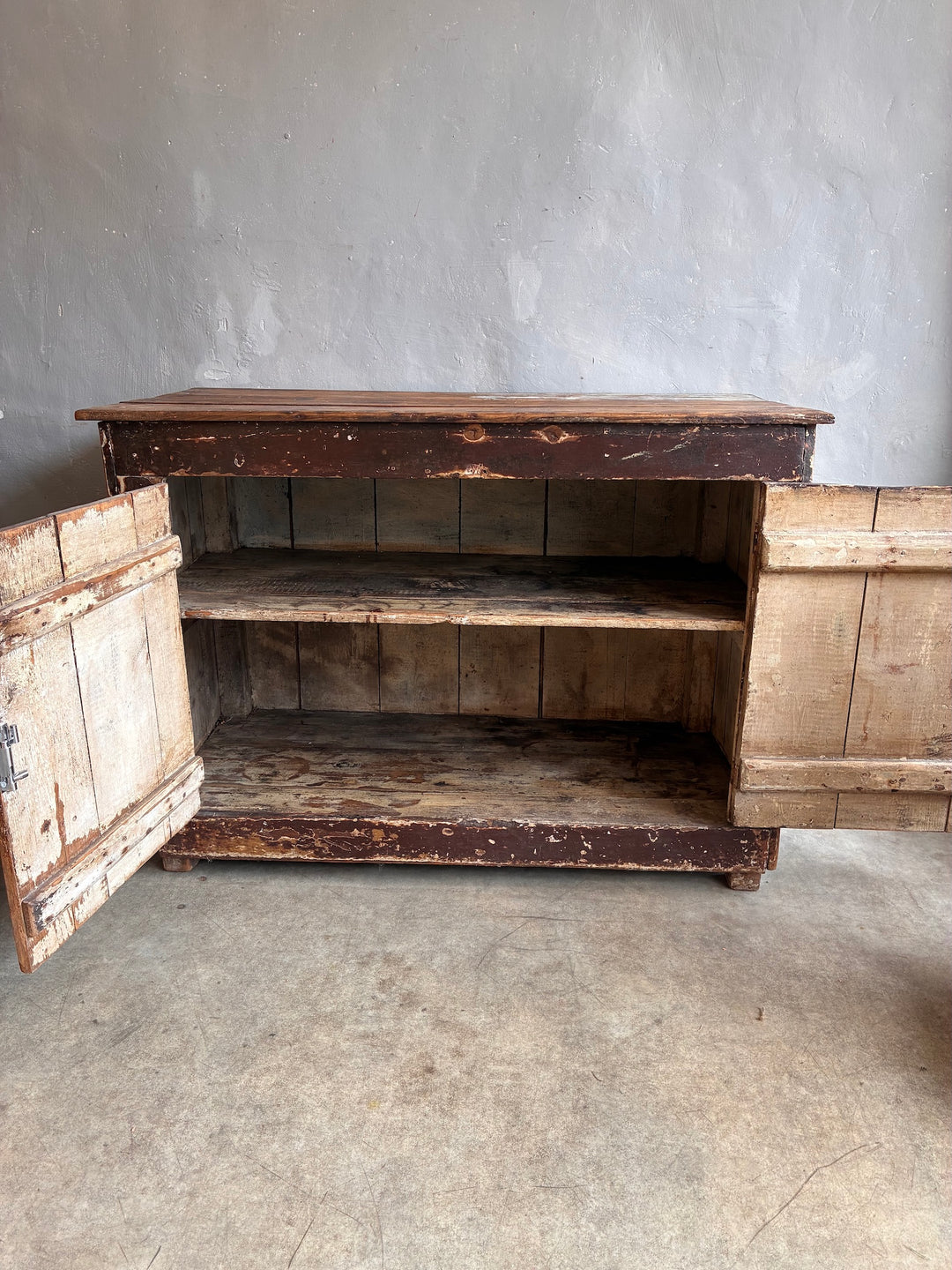 Primitive Antique Pine Wooden Sideboard with open doors revealing shelves and distressed finish.