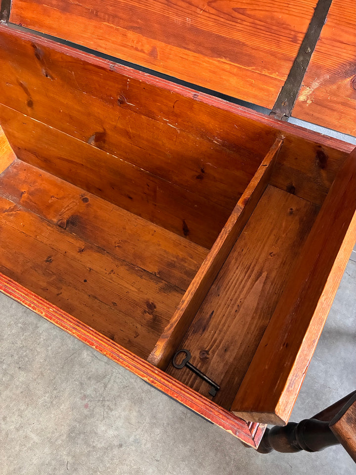 Interior view of Antique Danish Dowry Chest showing spacious storage with wooden finish and key.