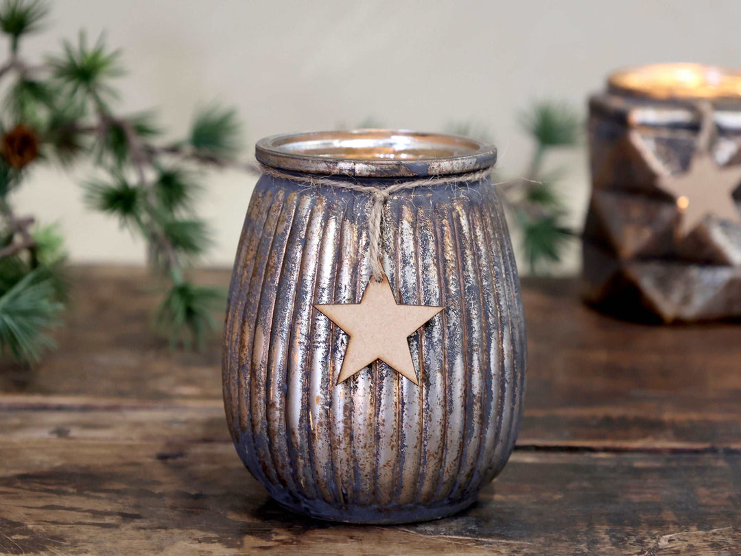 small aged look glass tea light holder with rustic wooden star