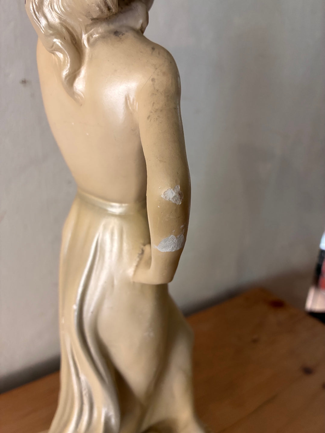 Antique Art Deco Chalkware Lady Figurine with slight wear and details of the back view.