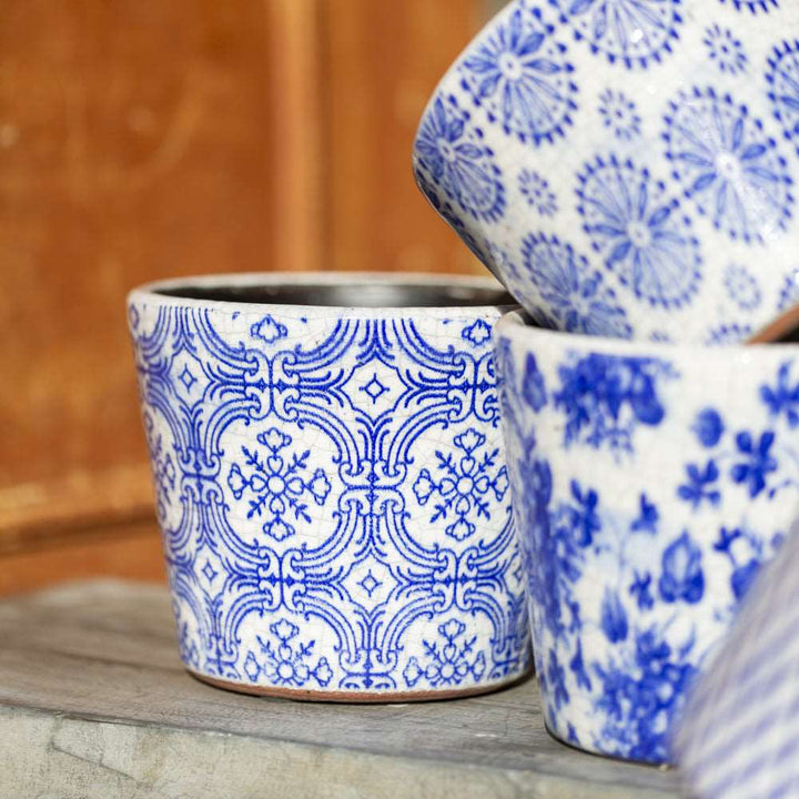 3 designs of vintage style dutch flowerpots in blue