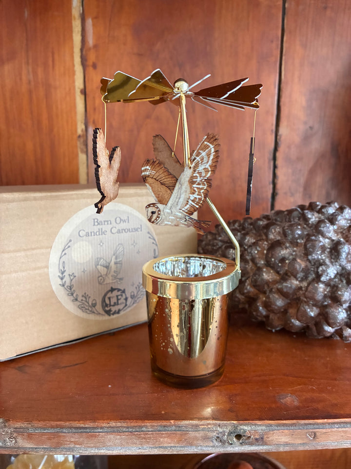 Barn Owl Candle Carousel by Lily Faith – Spinning Christmas Tealight Holder displayed with a glass candleholder.