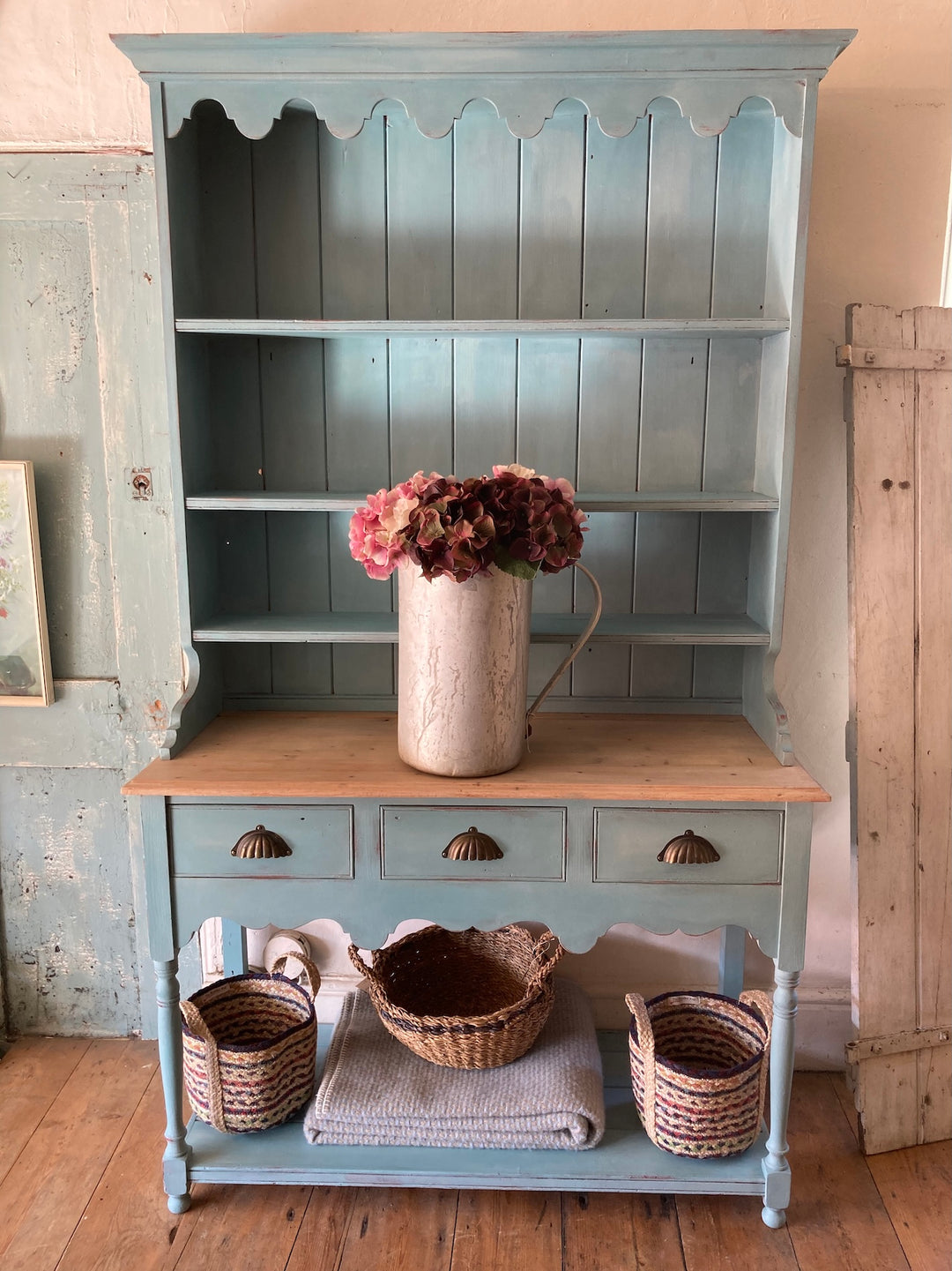 Vintage Blue Painted Dresser with shelves, drawers, and flowers, perfect for small spaces. Source for the Goose, Devon.