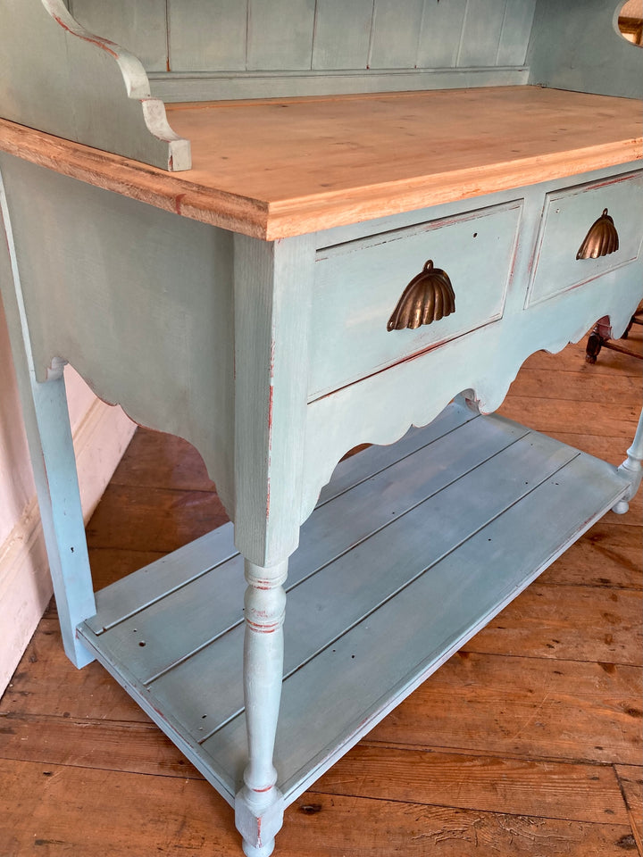 Vintage blue painted dresser with a natural wood top and gold drawer handles, perfect for small spaces from Source for the Goose Devon.