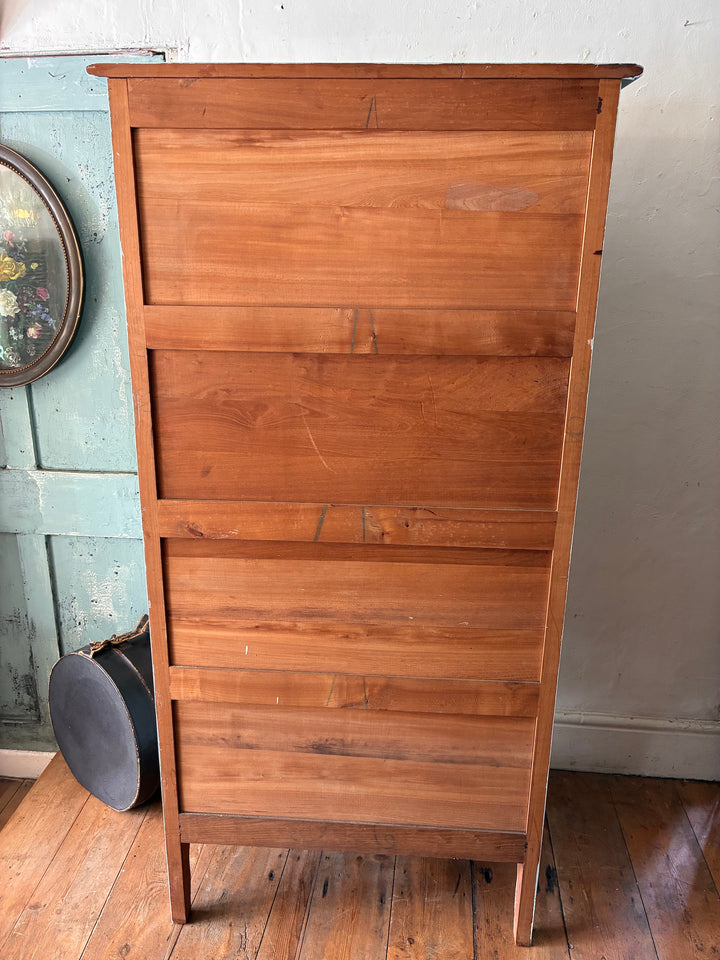 Small Blue Painted French Armoire shown in wooden form, highlighting its storage and charming design.