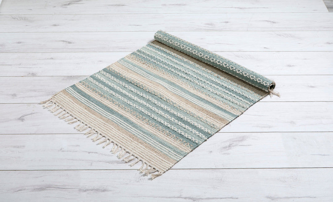 Blue Stripe Cotton Rug - Truro featuring soft blue stripes and delicate fringing, perfect for contemporary decor.