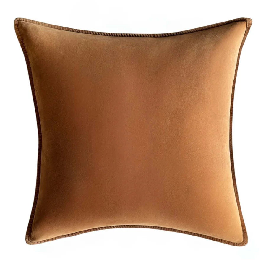 Stonewashed velvet cushion in caramel brown sugar color with matching velvet trim from Source for the Goose, Devon.
