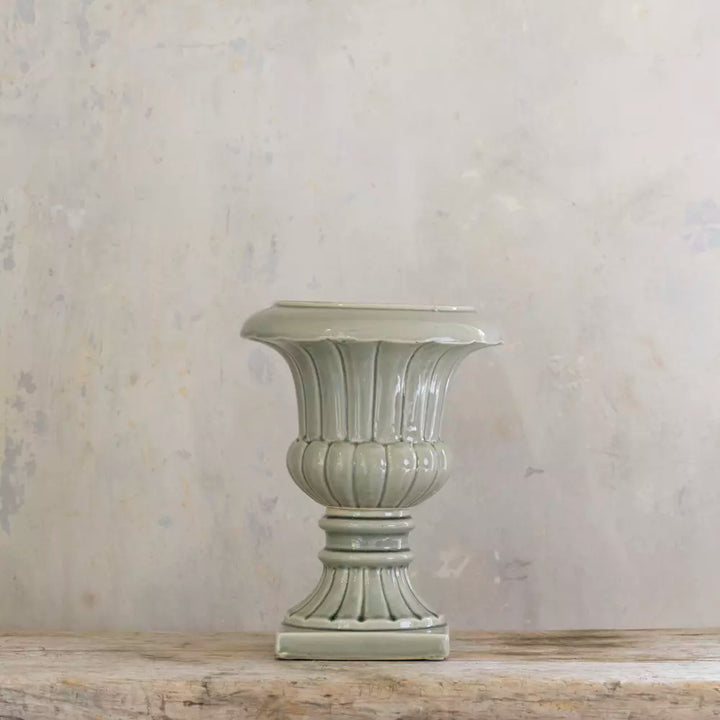 Pretty Green Ceramic Planter Vase on wooden table with elegant design, perfect for plants or flowers, Source for the Goose Devon.