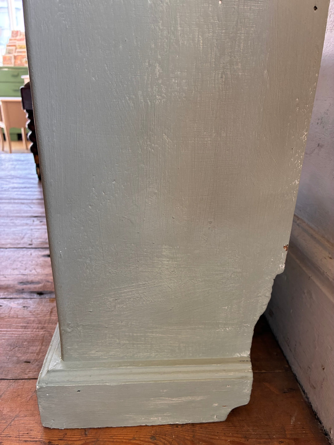 Tall Chippy Green Bookcase side view showing the textured eucalyptus green finish and vintage appeal.