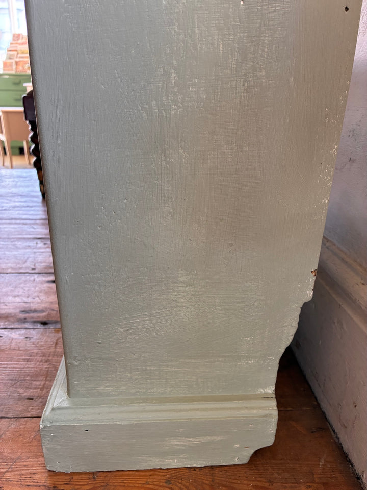 Tall Chippy Green Bookcase side view showing the textured eucalyptus green finish and vintage appeal.