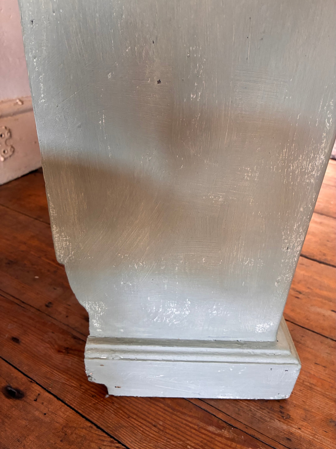 Close-up of the textured surface of the Tall Chippy Green Bookcase revealing its vintage charm and character.