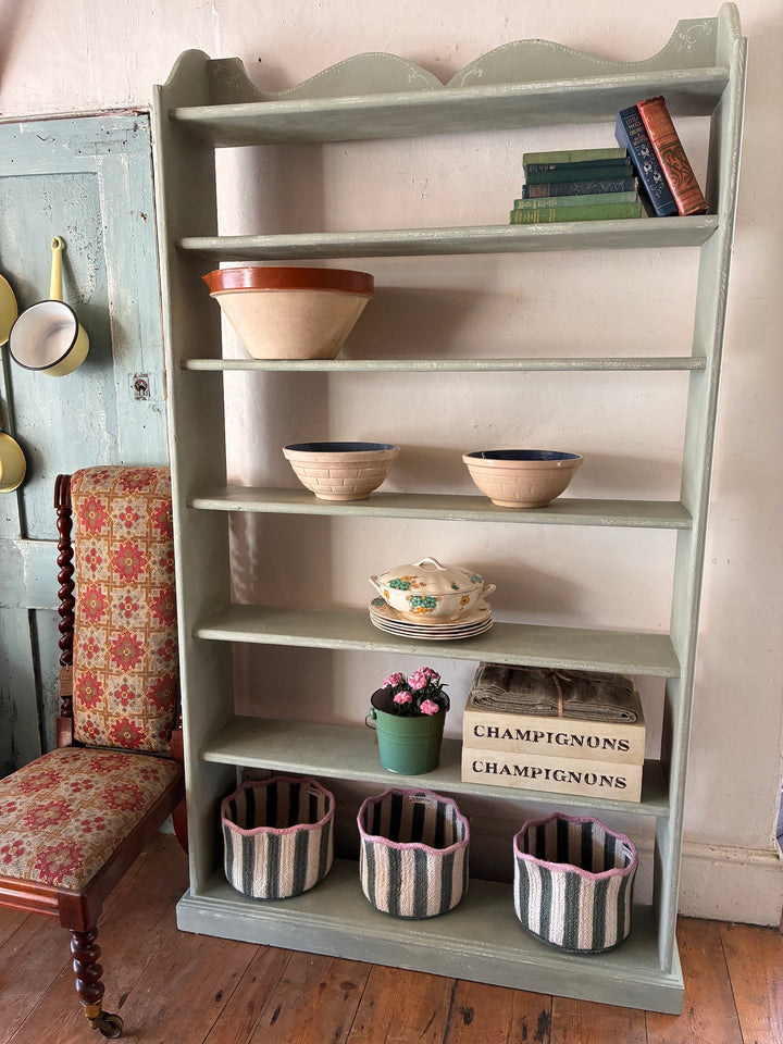 Tall Chippy Green Bookcase showcasing decorative bowls and pots, featuring vintage charm and a textured painted surface.