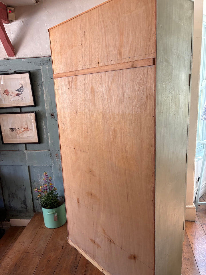 Tall Vintage Green Wooden Cupboard with chippy paint finish, showcasing rustic charm and ample storage options from Source for the Goose.