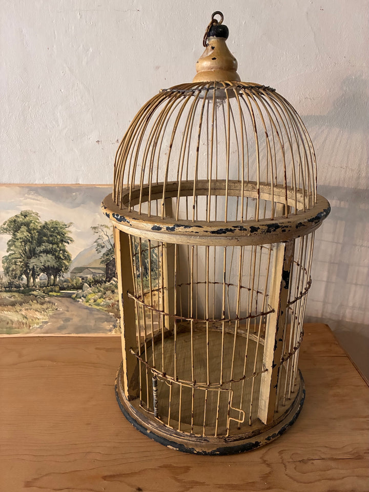 Decorative Antique Wooden Bird Cage with dome top and distressed cream finish, perfect for vintage home decor.