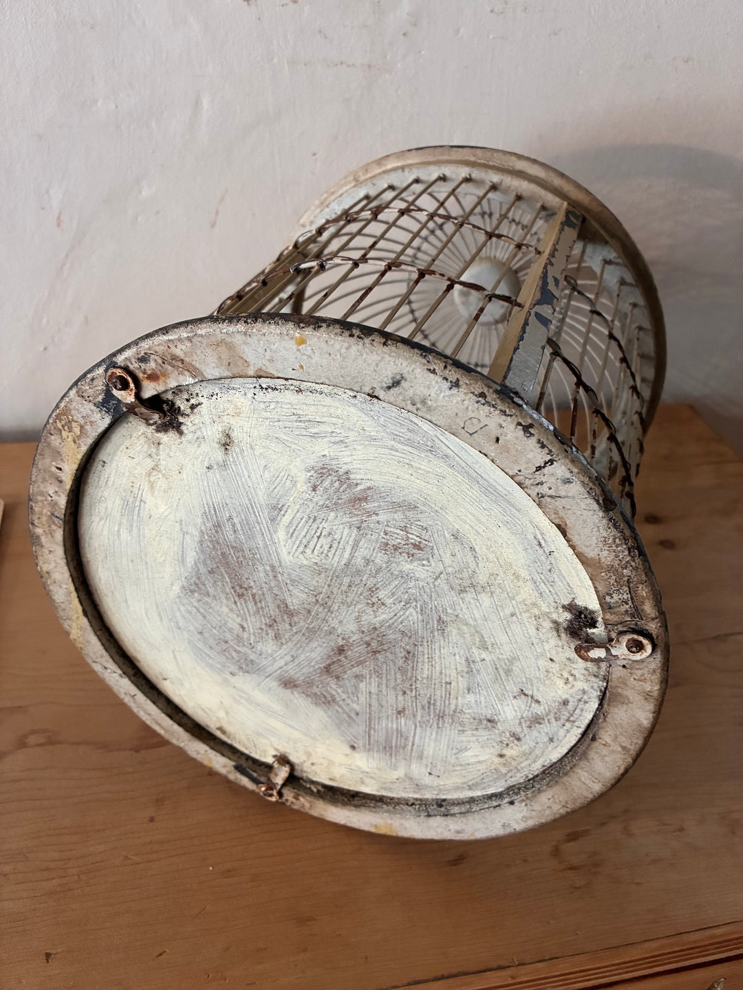 Decorative Antique Wooden Bird Cage base showcasing vintage charm and aged cream finish, perfect for vintage home decor.