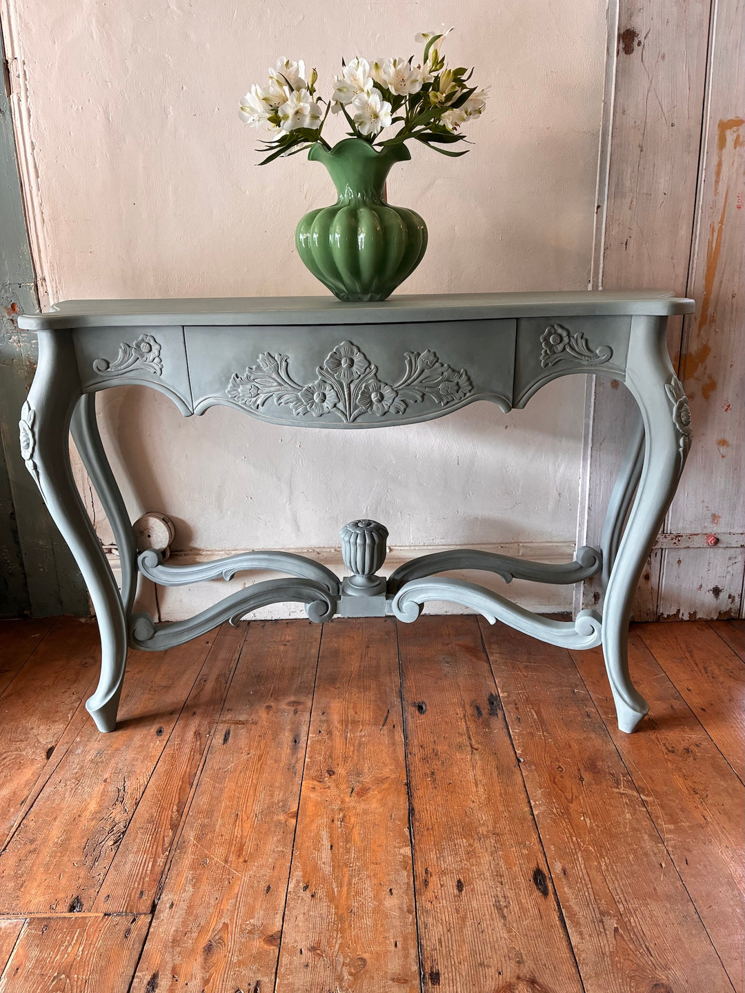 Duck Egg Blue Console Table with Cabriole Legs featuring elegant floral carvings and a vase of flowers on top.
