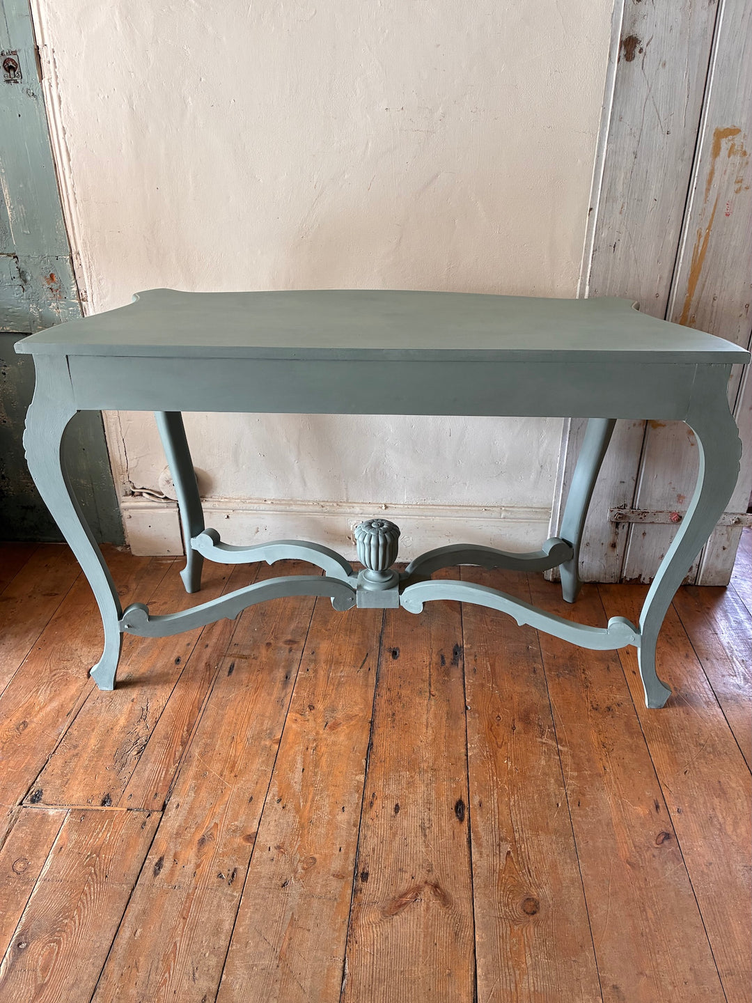 Duck Egg Blue Console Table with Cabriole Legs featuring floral carvings and a sleek serpentine design.