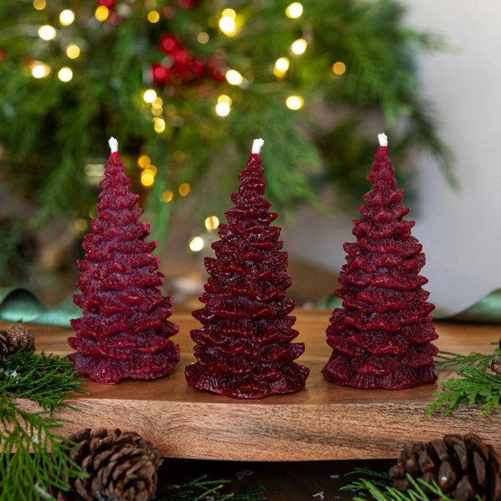 Pintail Candles - Christmas Spice Christmas Tree Candle trio of festive burgundy tree-shaped candles with decorations