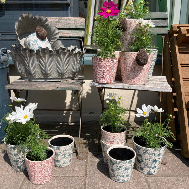 mix of  floral Vintage Floral Design Plant Pot with hedgehof pot hanger