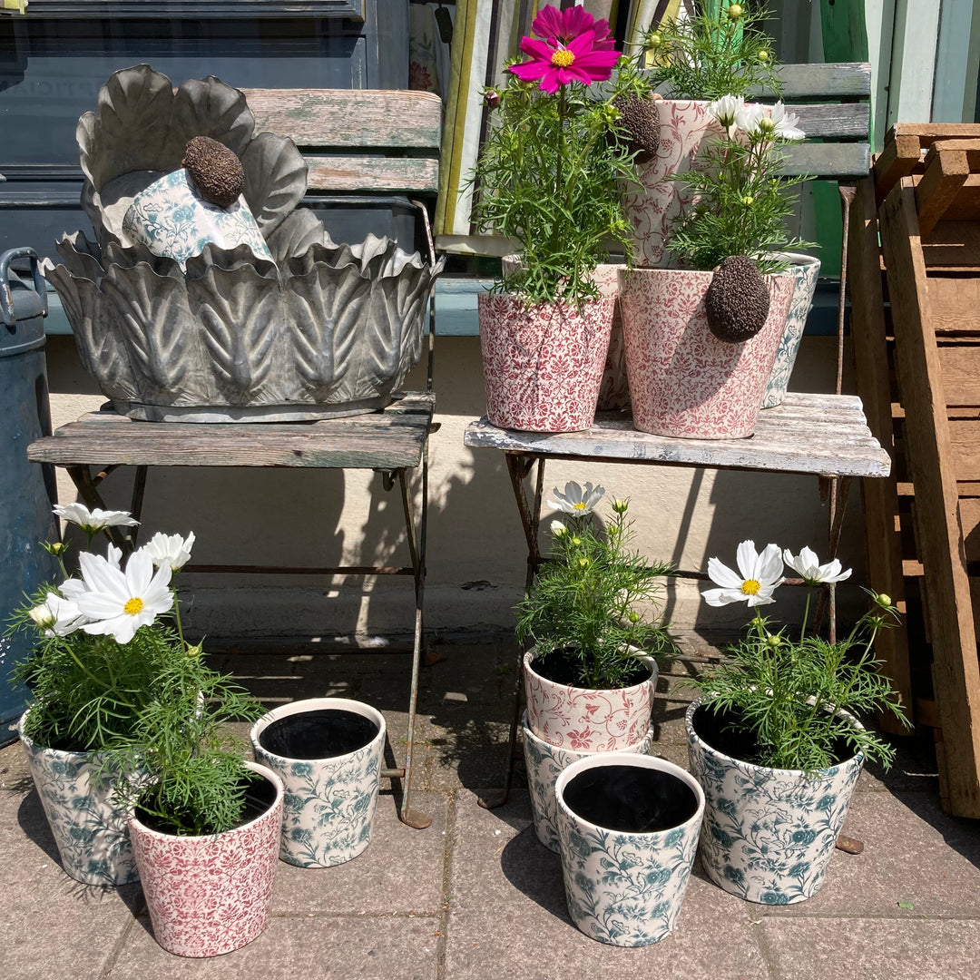 mix of vintage design flowerpots at Source for the Goose 