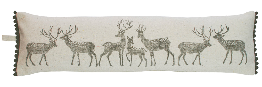 Forest Stag Draught Excluder Cushion featuring rustic stag silhouettes on a cotton dhurrie fabric.