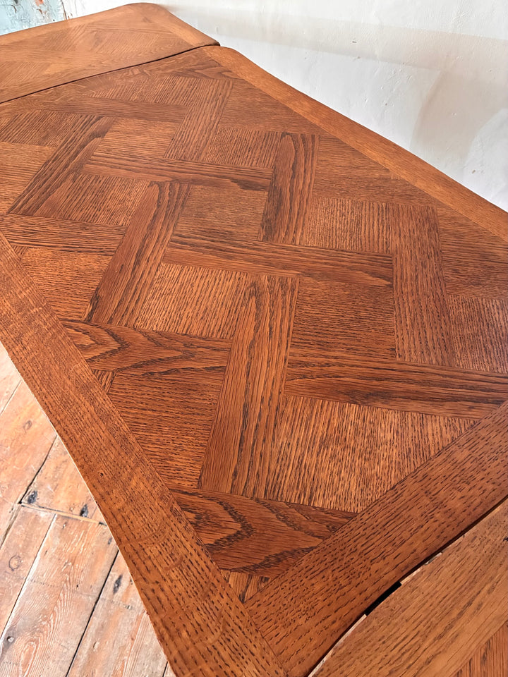 Vintage French Oak Parquet Top Table - Extending with intricate wood pattern and elegant design.