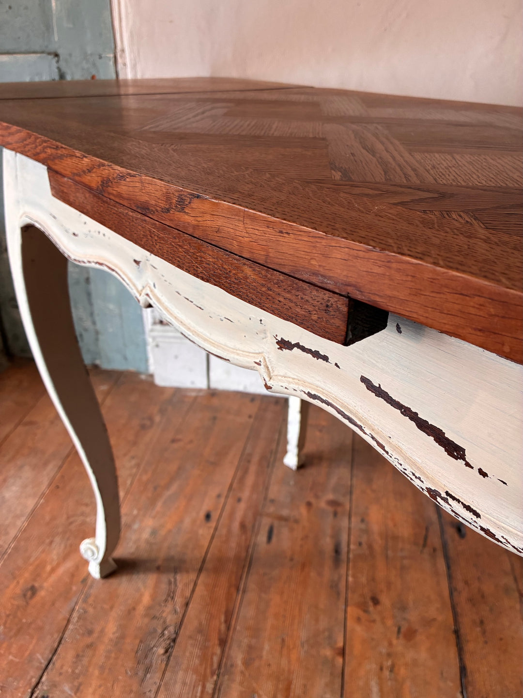 Vintage French Oak Parquet Top Table - Extending detail with cream-painted legs and parquet surface.