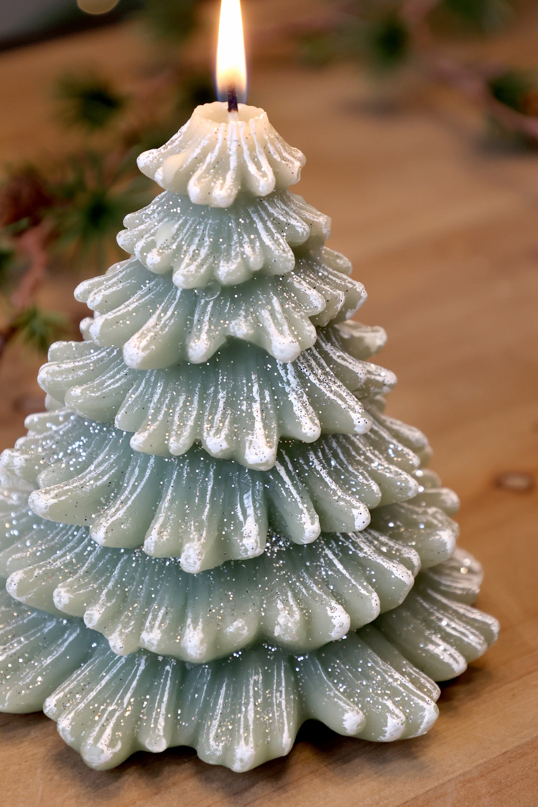 Green Christmas Tree Candle from Source for the Goose, bringing festive charm and sparkle to your home.