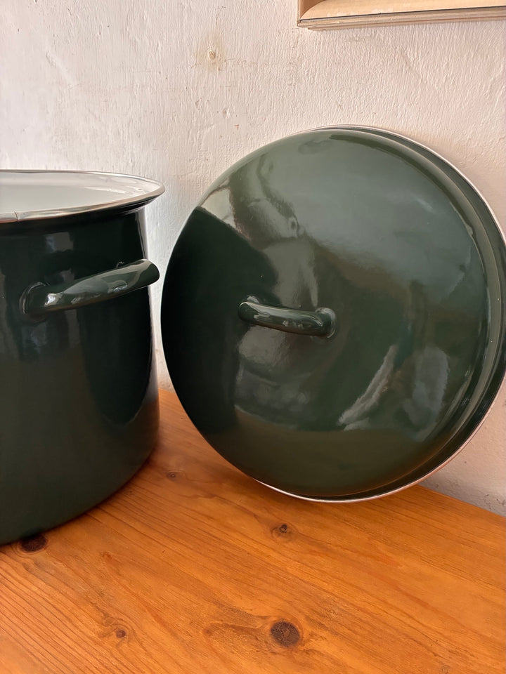 Vintage Green Enamel Bread Bin with matching lid on a wooden table, ideal for rustic country cottage kitchen decor.