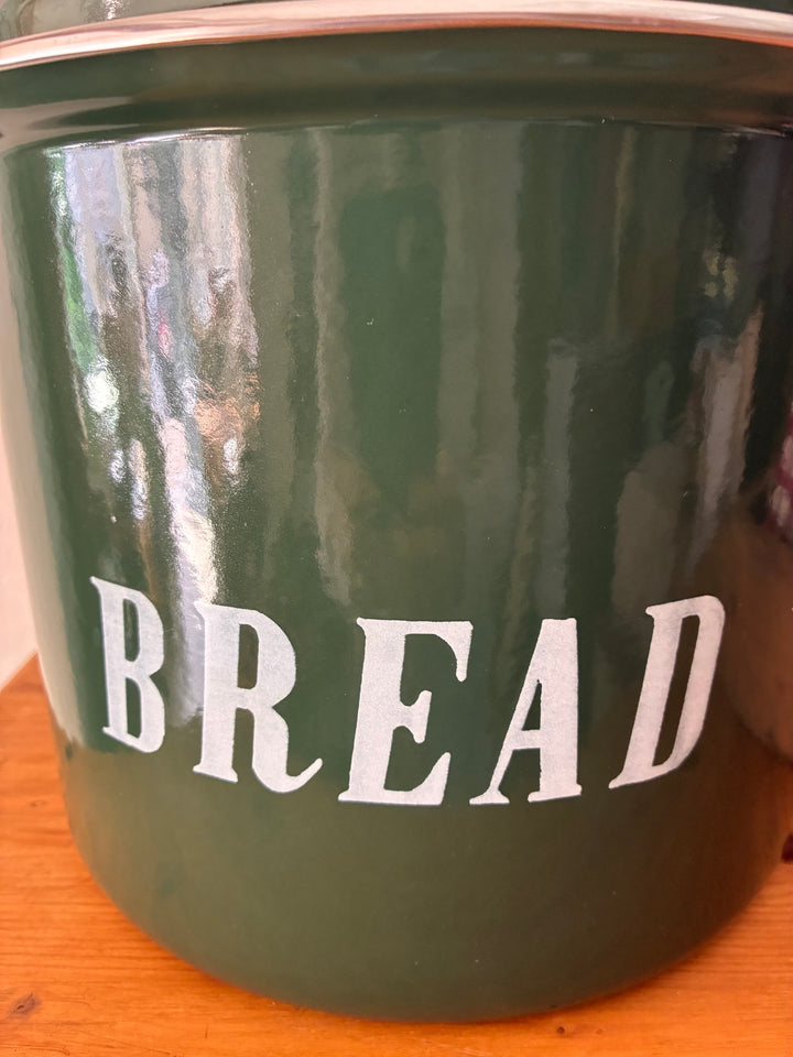 Vintage Green Enamel Bread Bin with white lettering in a rustic country cottage kitchen setting.