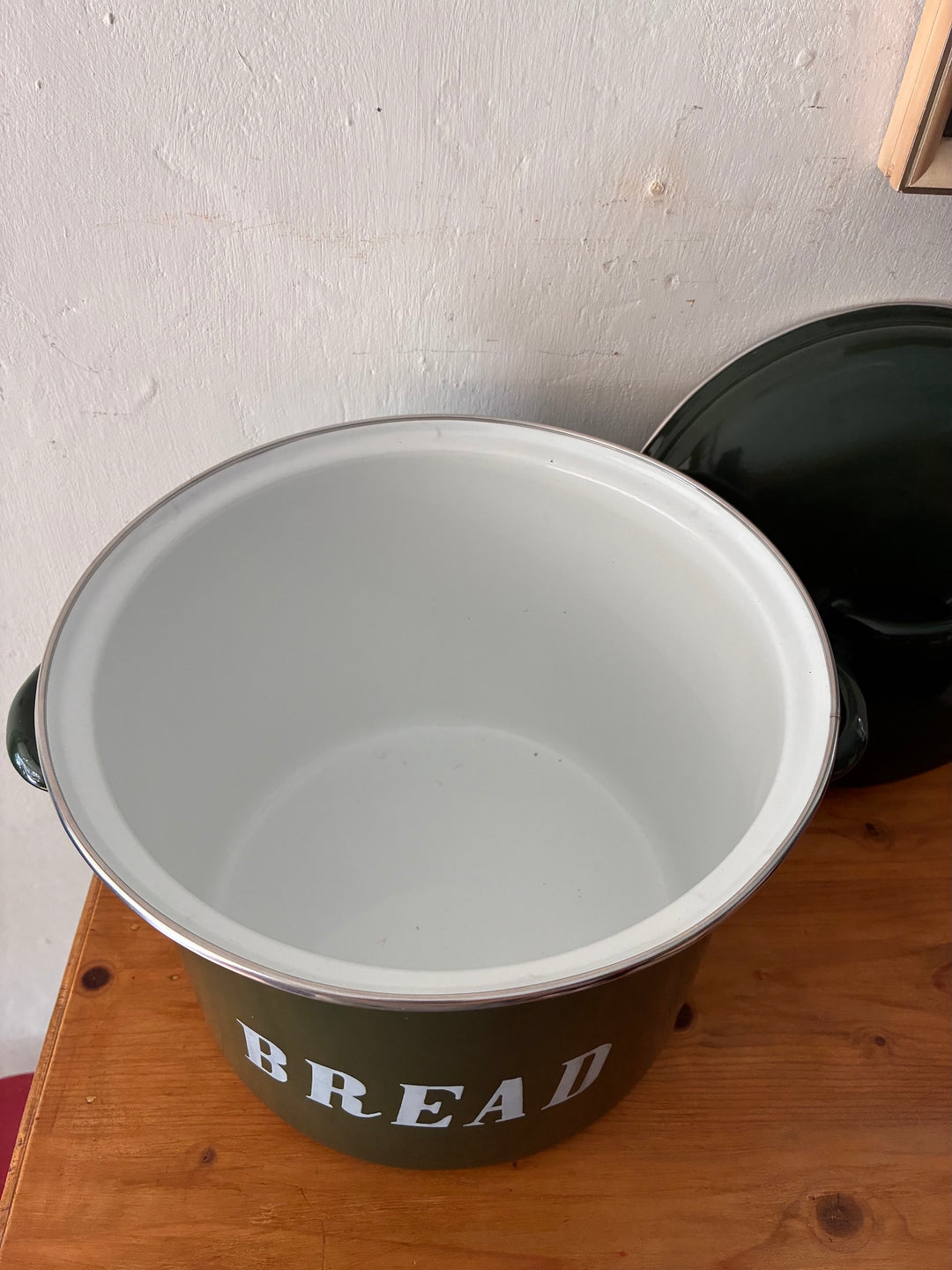 Vintage Green Enamel Bread Bin with white interior and handles, perfect for rustic country cottage kitchen storage.