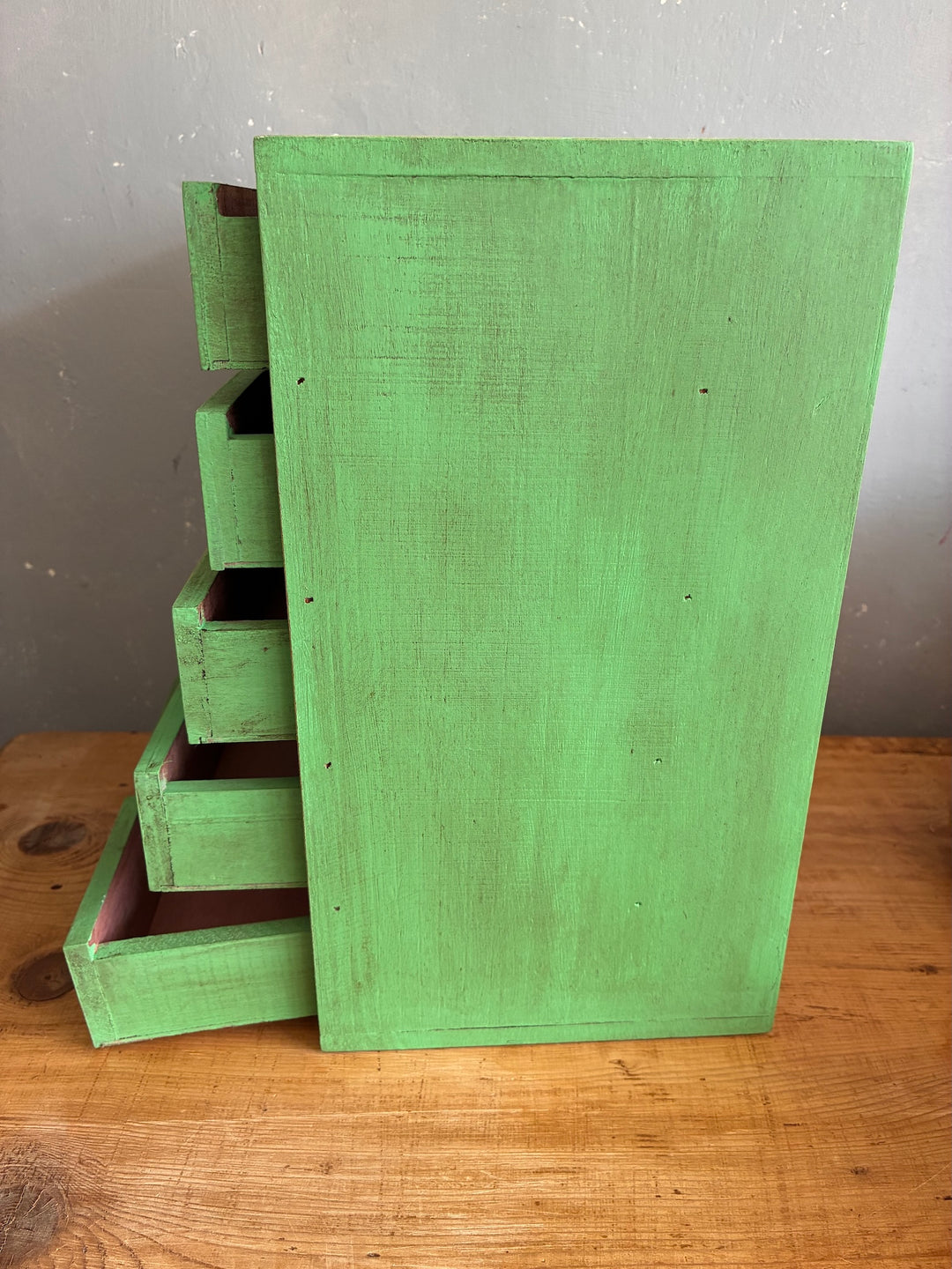 Vintage Green Mini Set of Drawers side view showcasing hand-painted aged green wood finish.