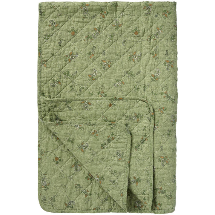 Soft Green Quilted Throw featuring a floral paisley pattern, perfect for cozying up in a country cottage setting.