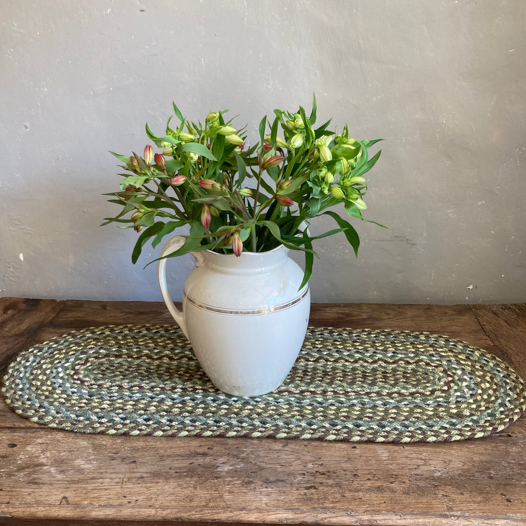 Table Runner in Hedgerow Green by the Braided Rug Company at Source for the Goose, Devon