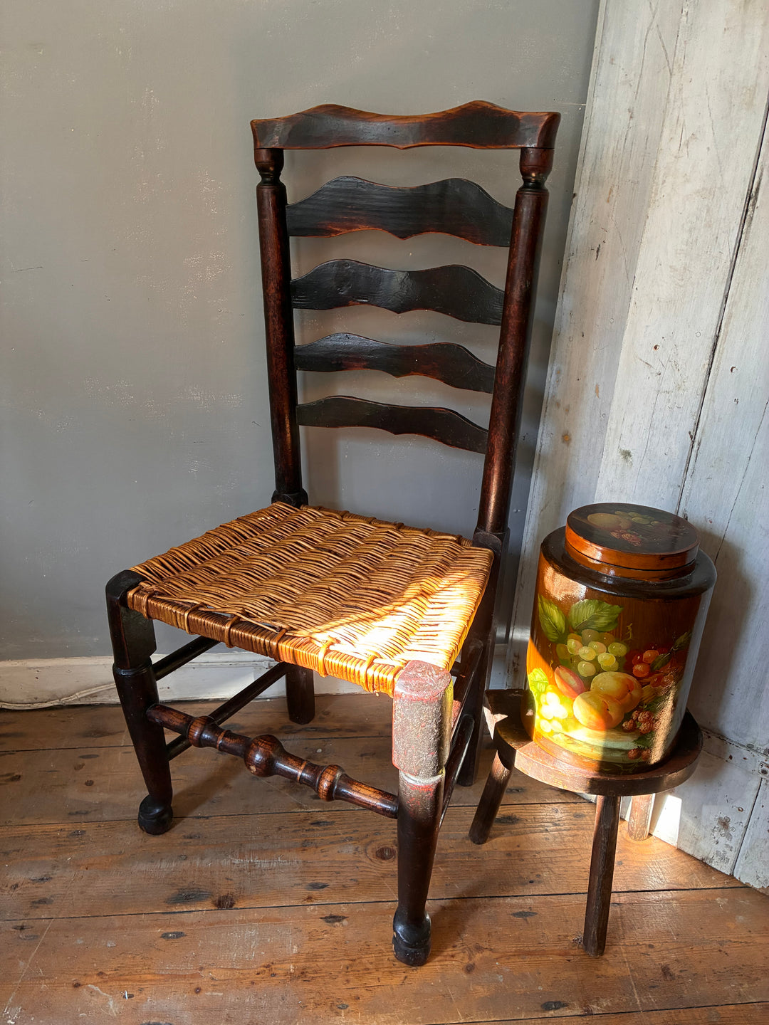 Antique Ladderback Chair - Lancashire showcasing classic 19th-century craftsmanship and hand-woven rush seat.