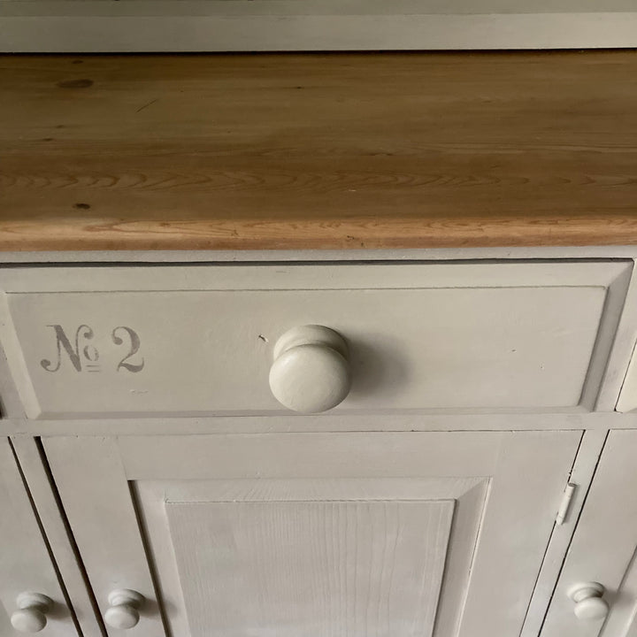 stencilled french style number two on dresser drawer