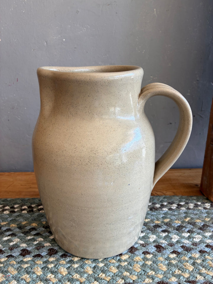 Large Stoneware Studio Pottery Jug in soft putty glaze, perfect for flowers or serving with elegance.