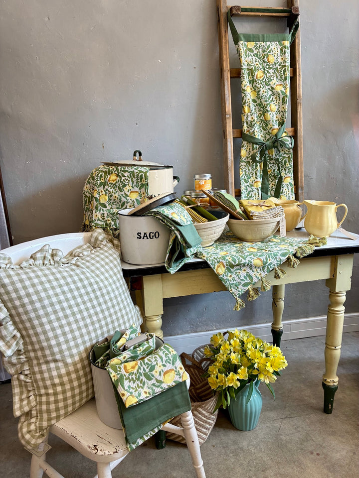 Cheerful kitchen scene featuring Set of Two Summery Lemon Tea Towels from Source for the Goose, Devon.
